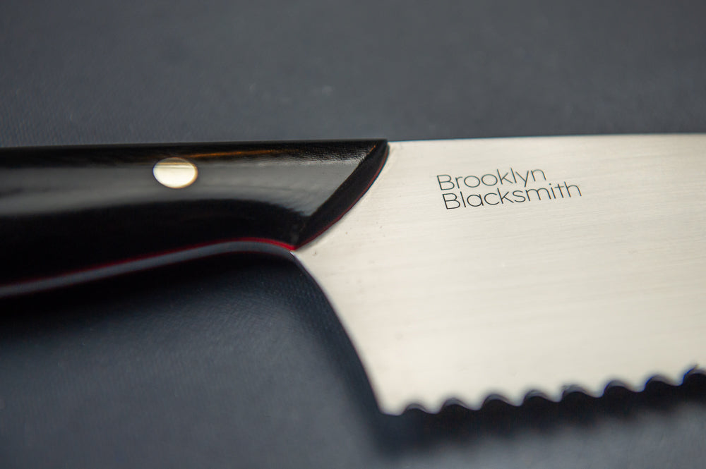 Bread Knife- Black Micarta with Medium Red Liners and Silver Mosaic Pin